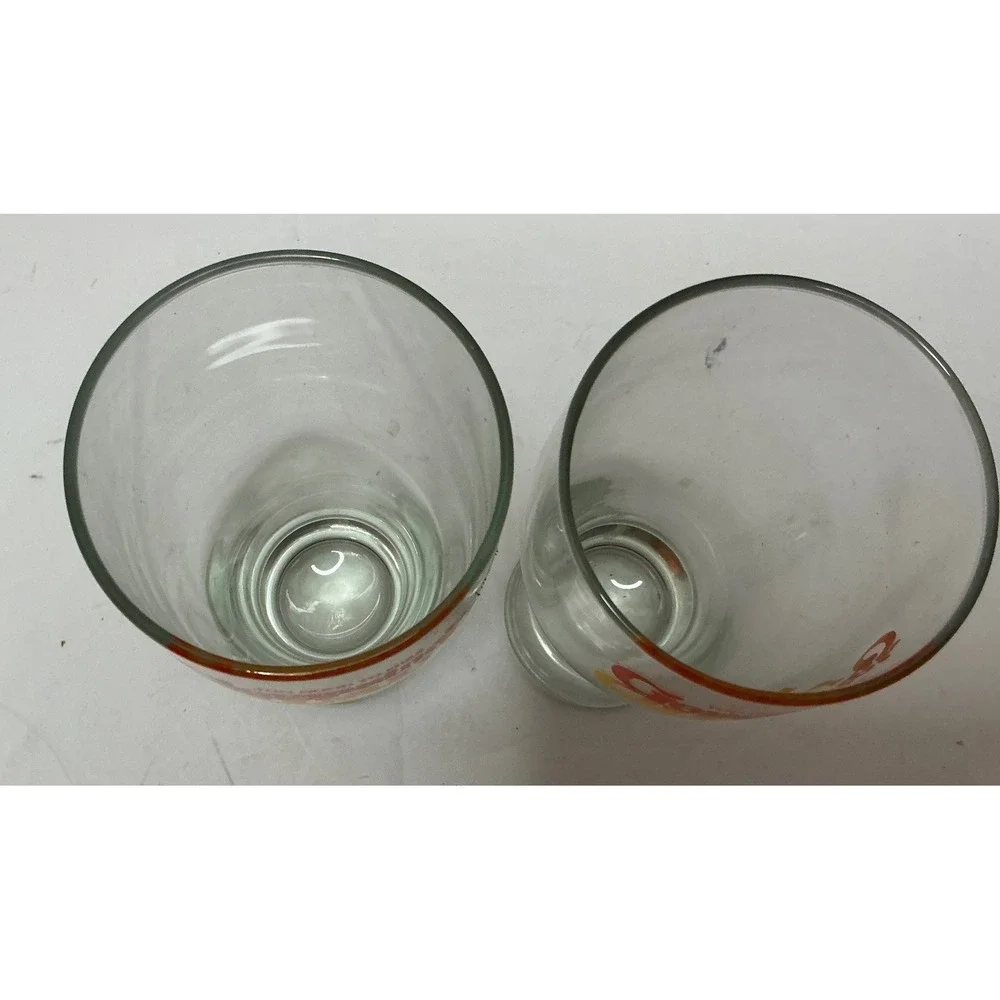 Germaine's Luau Vintage Souvenir Glasses Hawaii Footed Pilsner Set of 2 Tiki Bar
